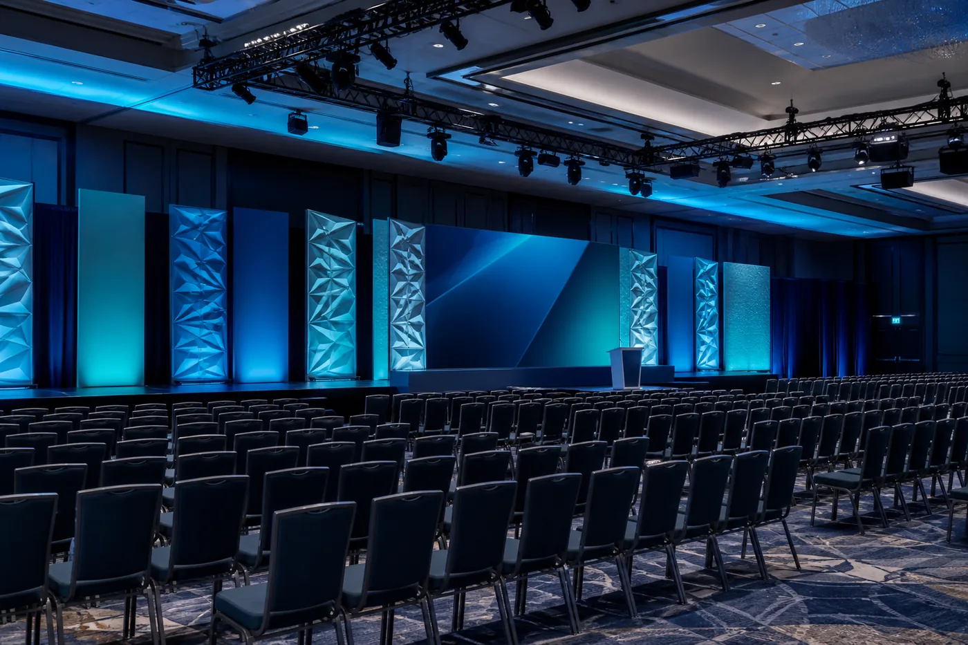 Corporate venue transformation with scenic walls and AV infrastructure